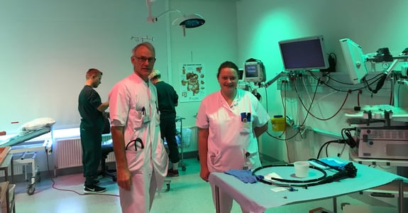 Healthcare personnel stand in a new operating theater with ergonomic lighting from Chromaviso